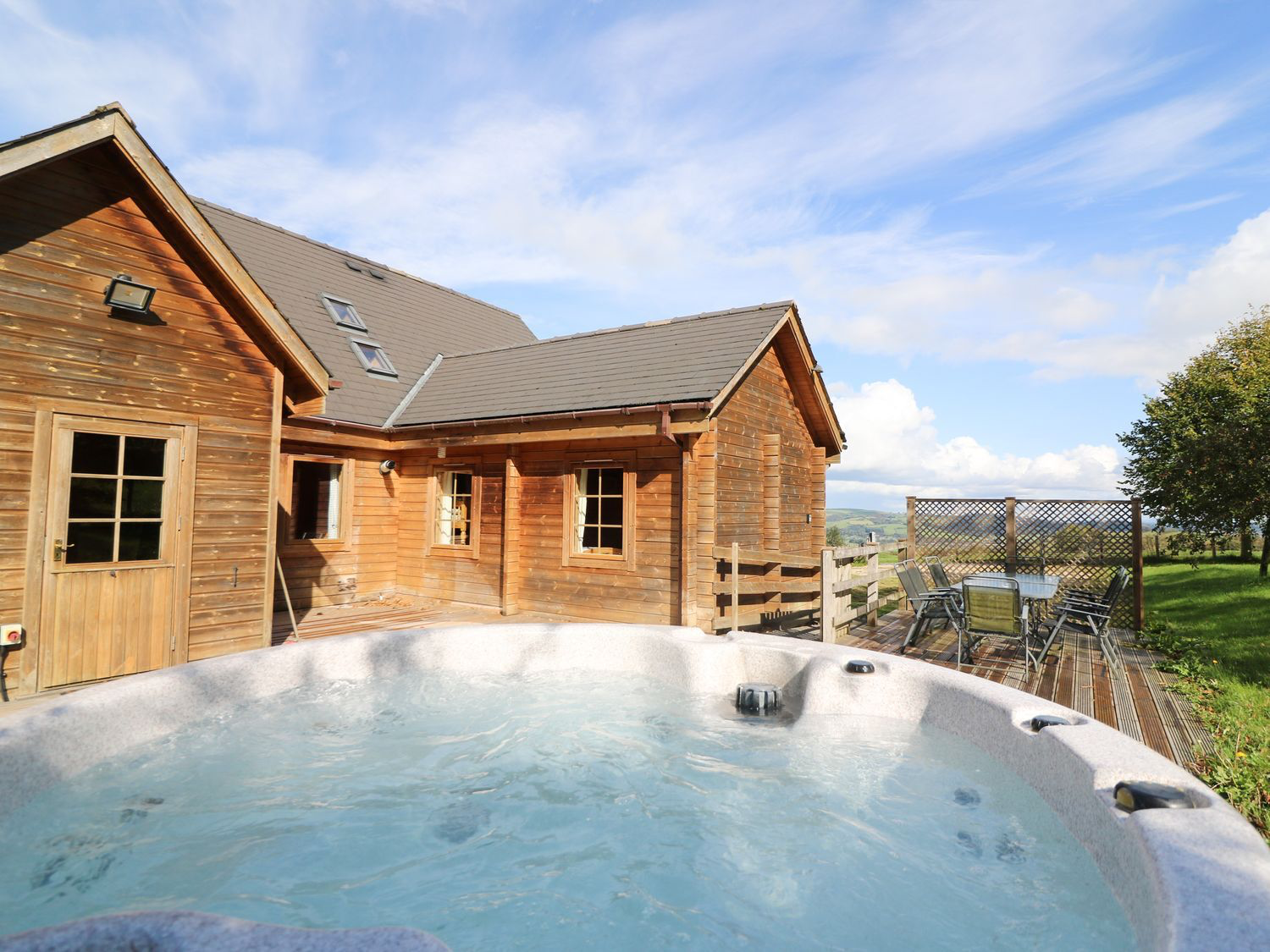 Dan Y Coed lodge with hot tub and views over the Welsh hills