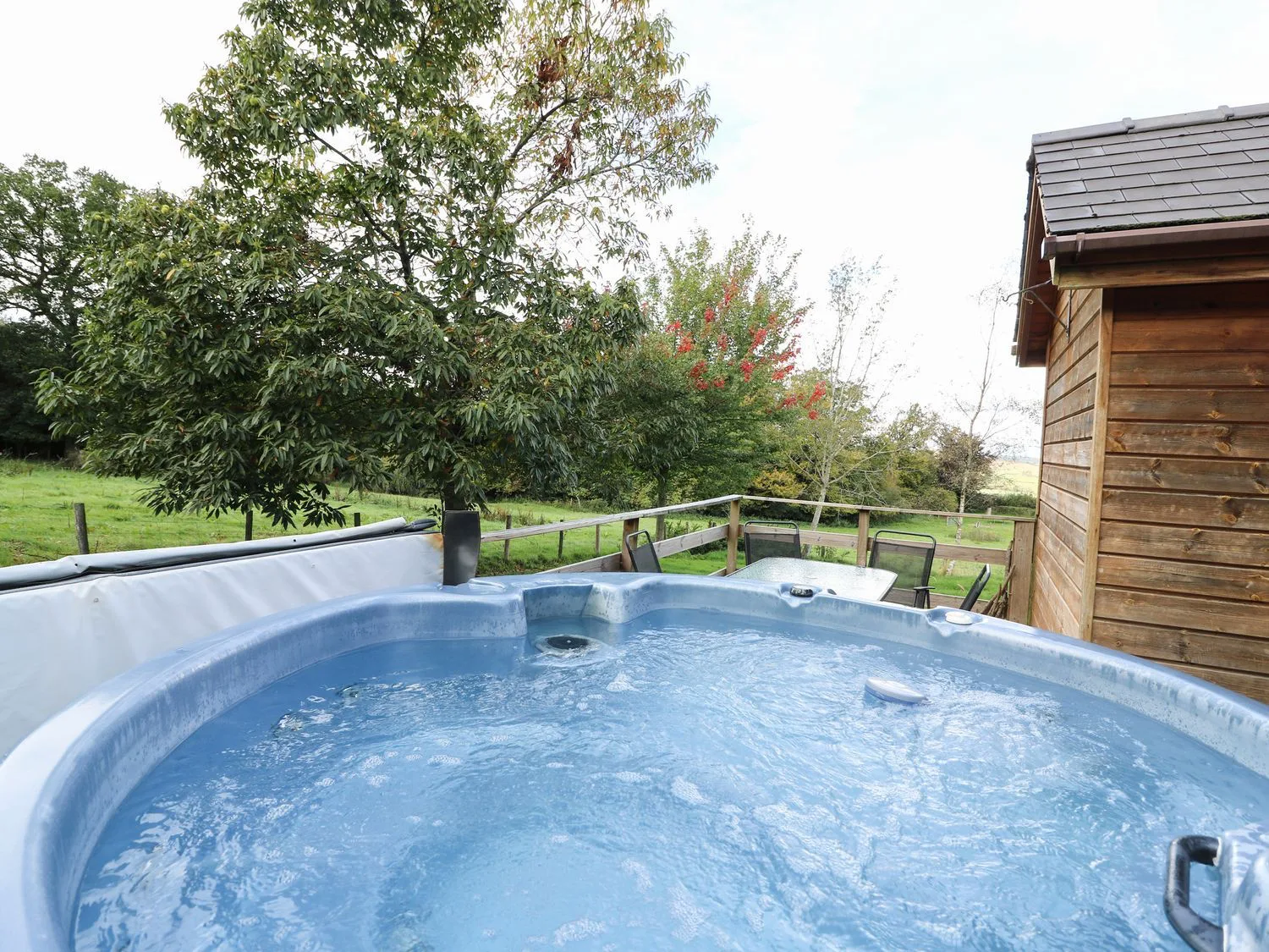 Private hot tub overlooking the fields